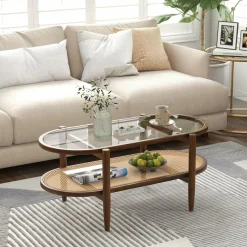 Tangkula Rattan Coffee Table, 40”L Boho Oval Acacia Wood Cocktail Table with Tempered Glass Tabletop & PE Rattan Storage Shelf